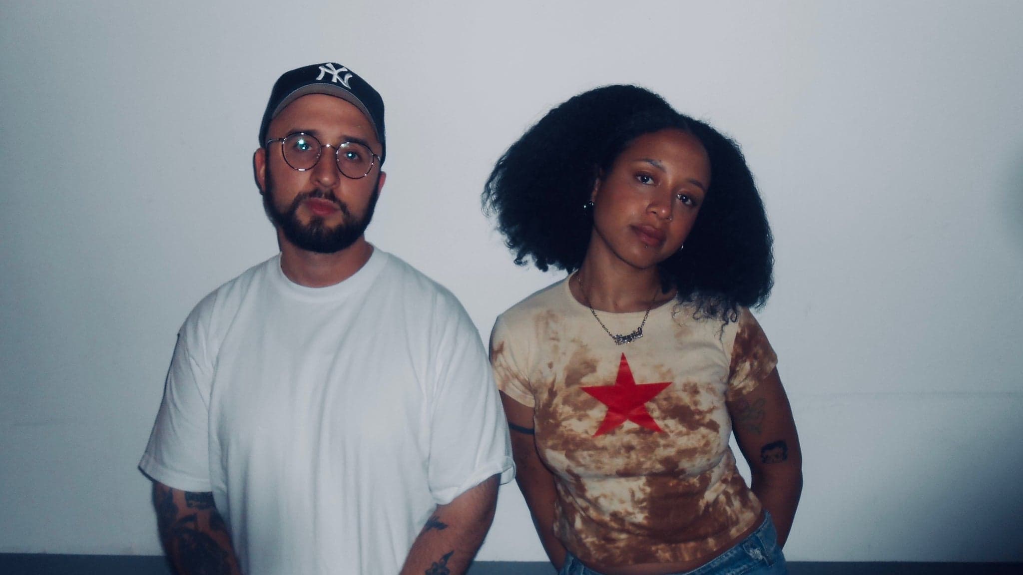 Anysia Kym & Tony Seltzer with Alexander Spit artwork from The Echo